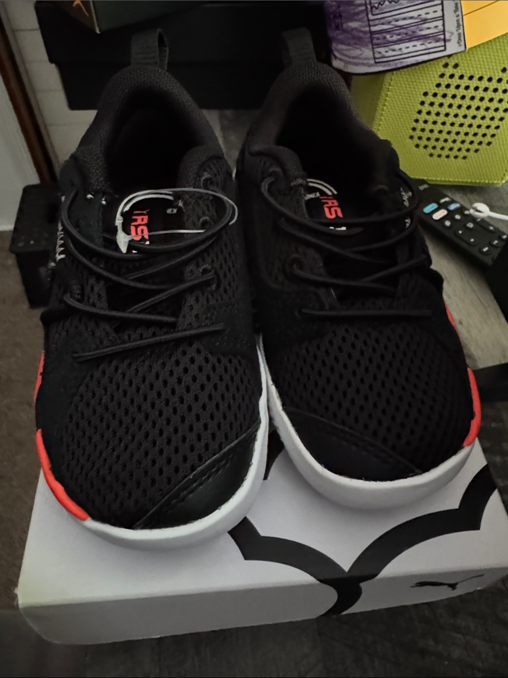 Puma Kids Black Sneakers with Red Accents